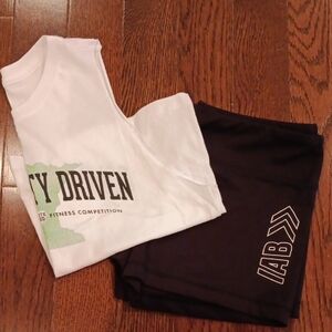 White Graphic Tank and Black CrossFit Shorts